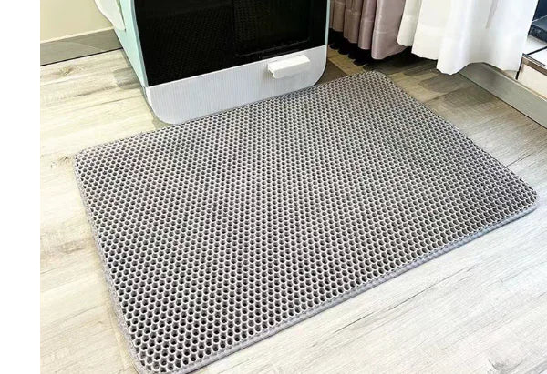 Tapis de litière double couche